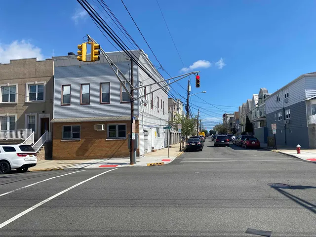 a view of a street with cars