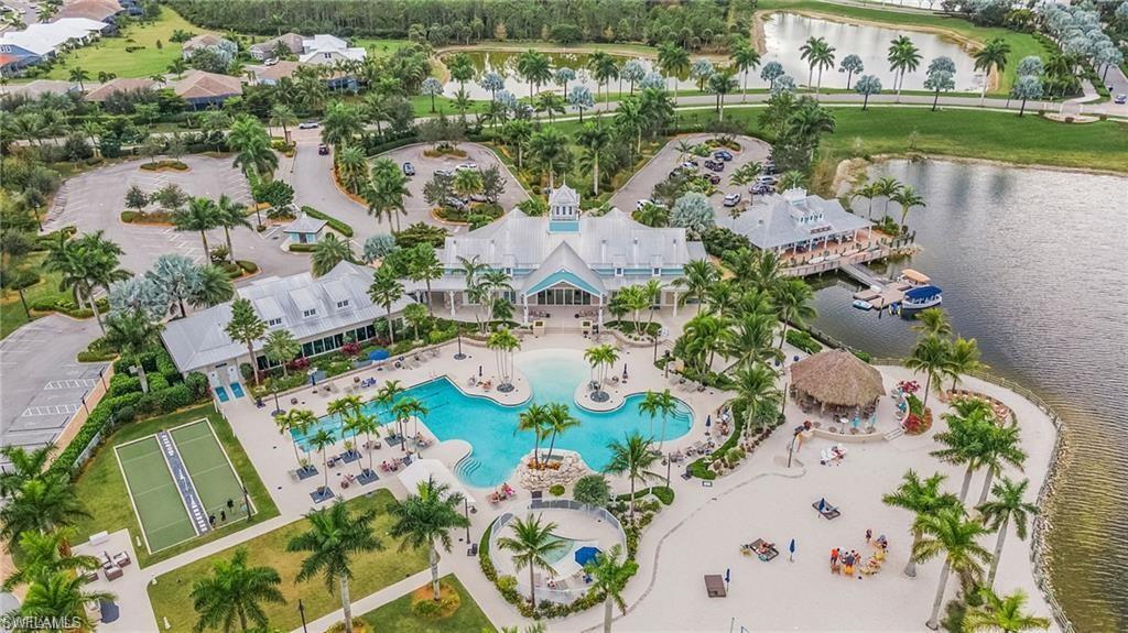 14274 Charthouse Circle Naples, FL 34114 - Photo 2 of 4 an aerial view of lake residential house with outdoor space