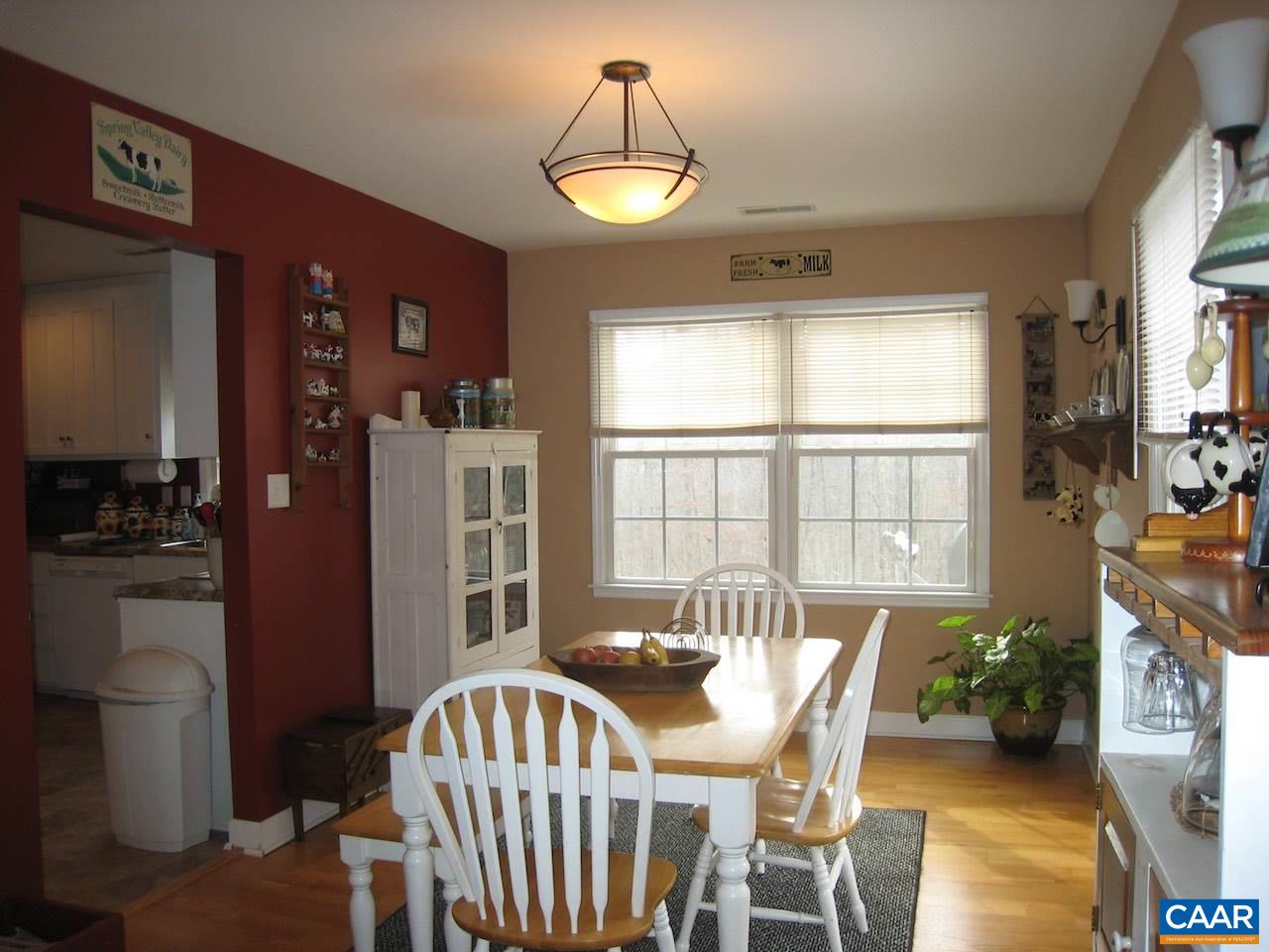 262 Pine Ridge Road Faber, VA 22938 - Photo 26 of 45 a view of a dining room with furniture window and outside view