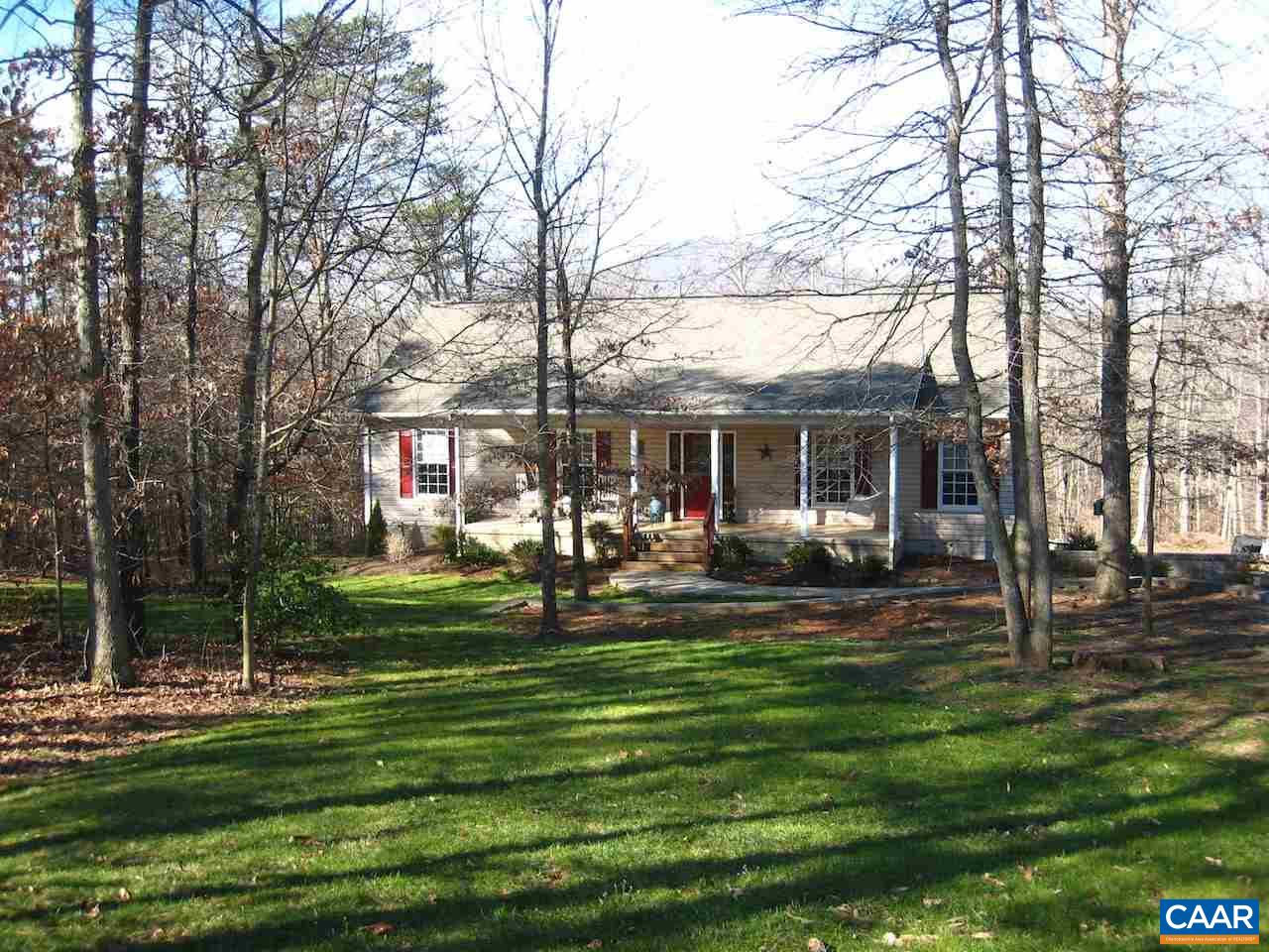 262 Pine Ridge Road Faber, VA 22938 - Photo 3 of 45 a front view of a house with a garden