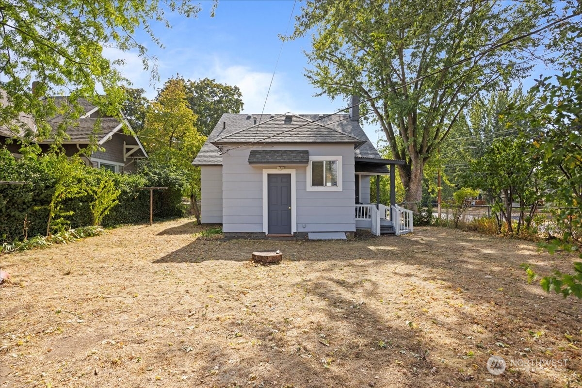 703 Washington Street Walla Walla, WA 99362 - Photo 22 of 30 a view of a house with a yard