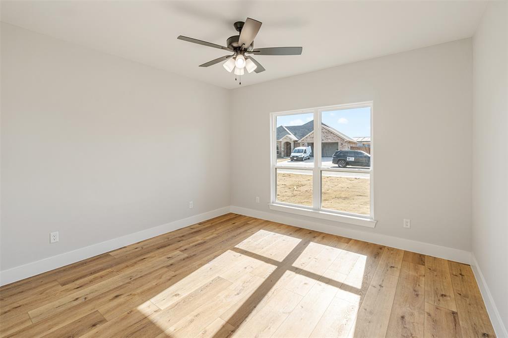 502 Limestone Circle Mabank, TX 75147 - Photo 24 of 38 an empty room with a window