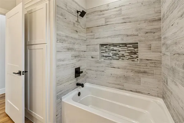 a bathroom with a bathtub