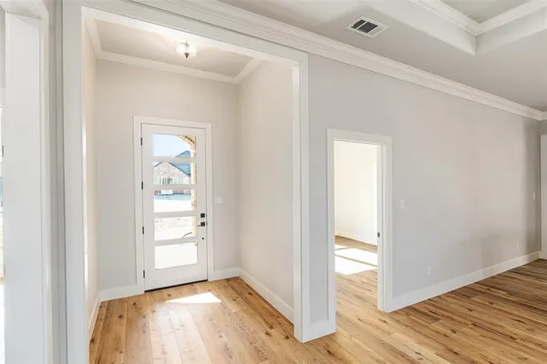 a view of livingroom with wooden floor