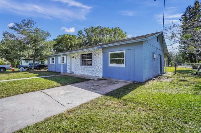 a view of outdoor space yard and front view of a house