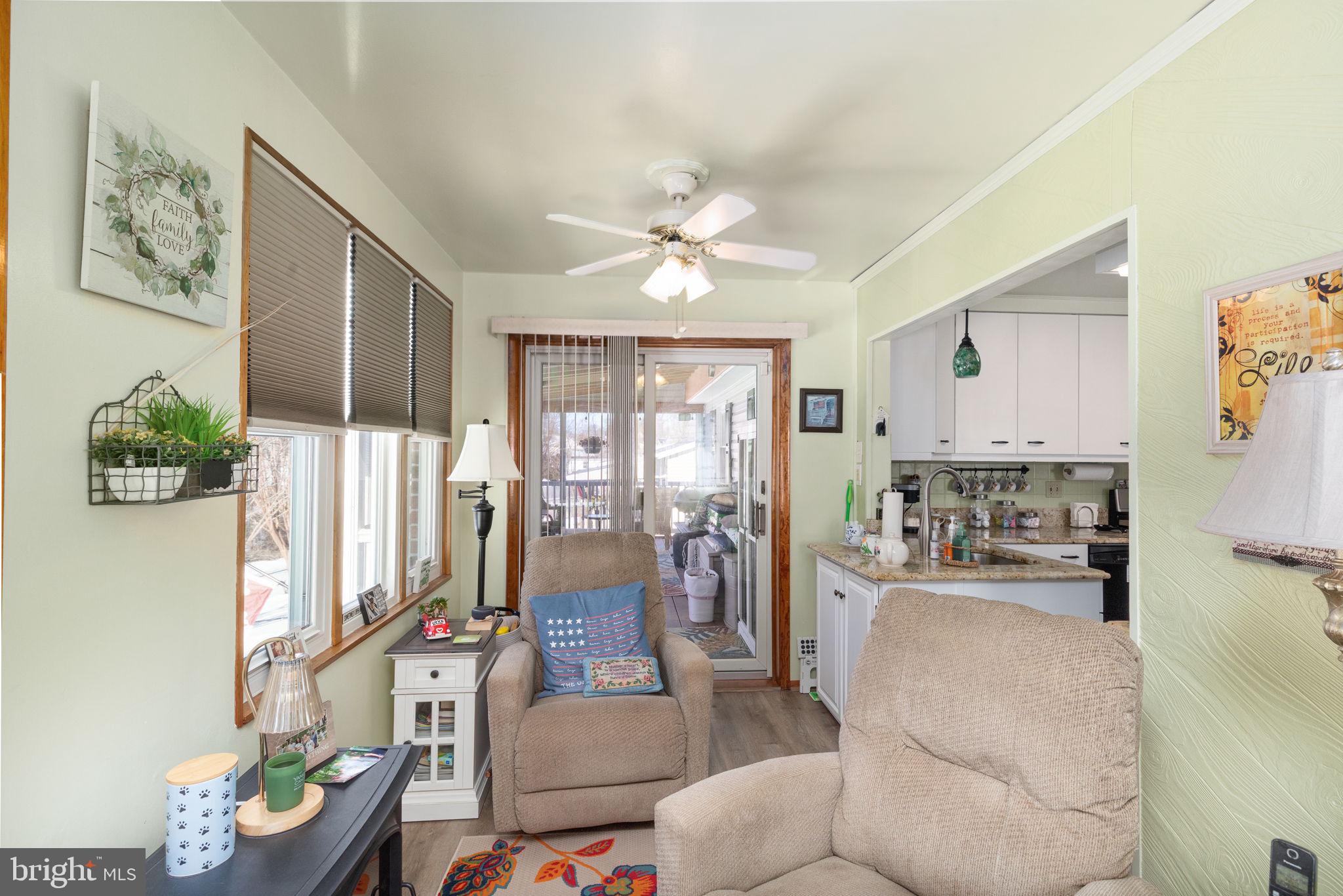 3409 Acton Road Parkville, MD 21234 - Photo 11 of 27 a living room with furniture and a large window