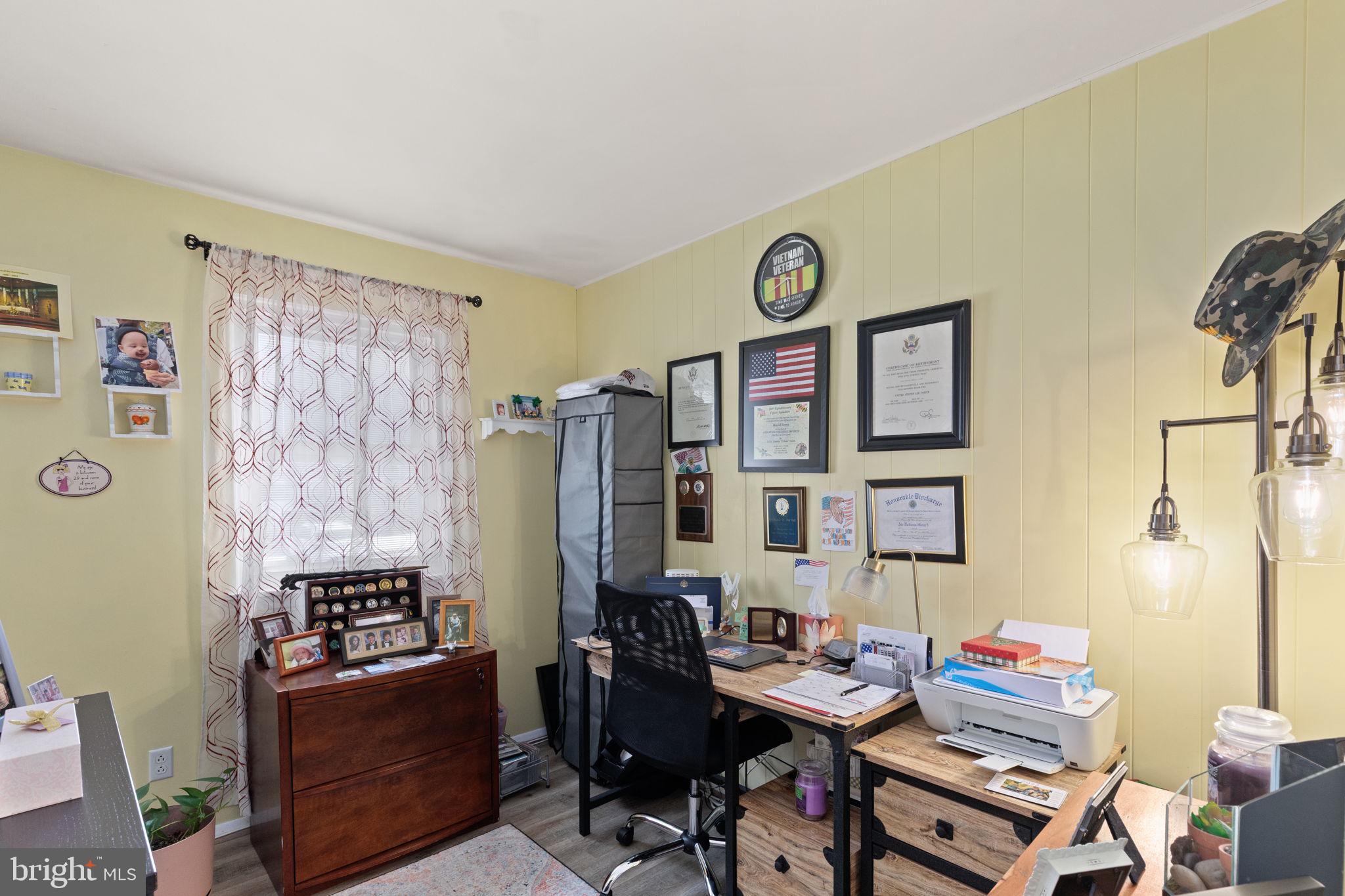 3409 Acton Road Parkville, MD 21234 - Photo 20 of 27 a room with furniture and a window