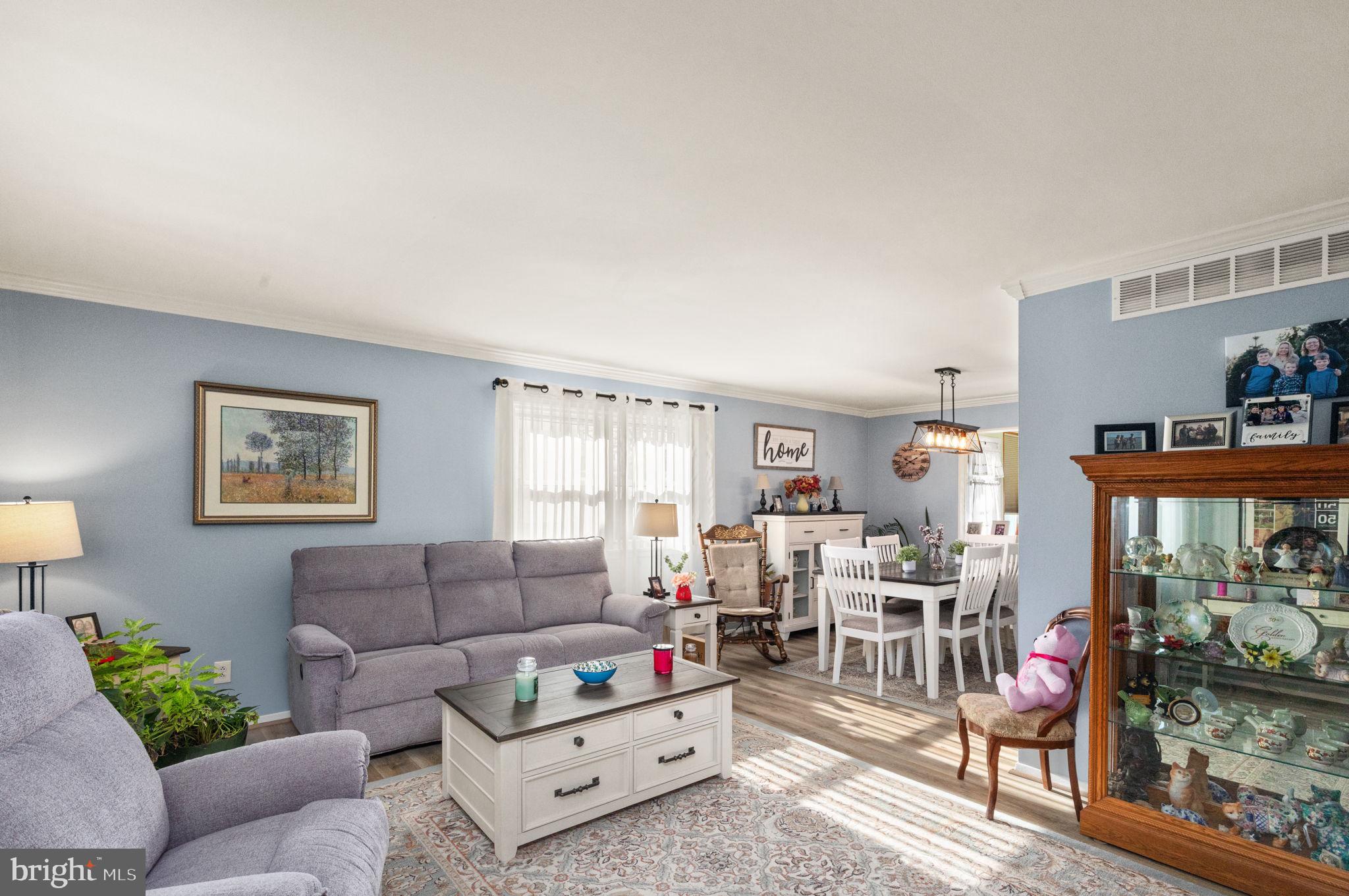 3409 Acton Road Parkville, MD 21234 - Photo 2 of 27 a living room with furniture and a window