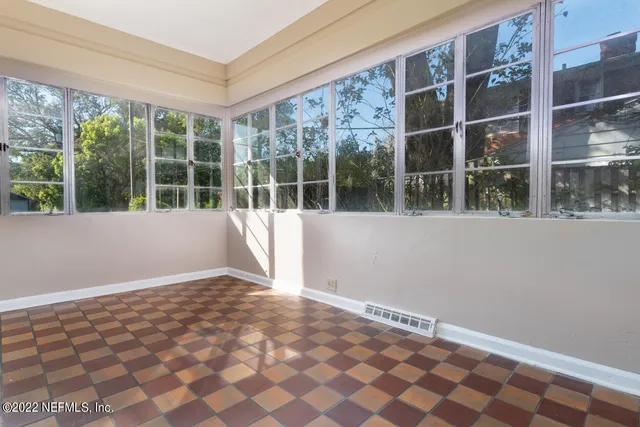 a bathroom with a shower and a toilet