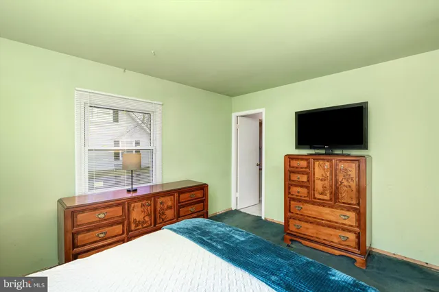 a bathroom with a sink a toilet and a bathtub