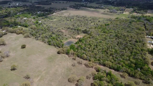 a view of a backyard of a house