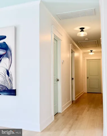 a view of a hallway with closet