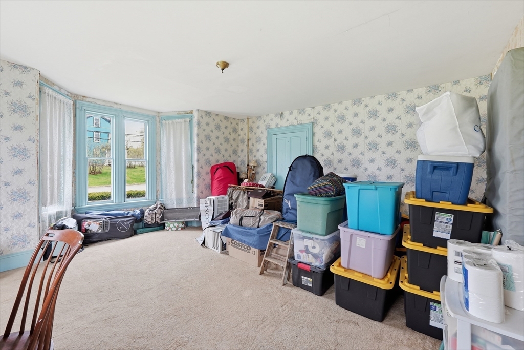 16 Main Street Brookfield, MA 01506 - Photo 19 of 45 a view of a room with furniture and toys