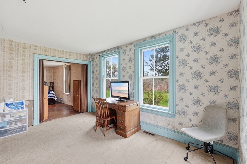 16 Main Street Brookfield, MA 01506 - Photo 20 of 45 a view of a livingroom with workspace and a window