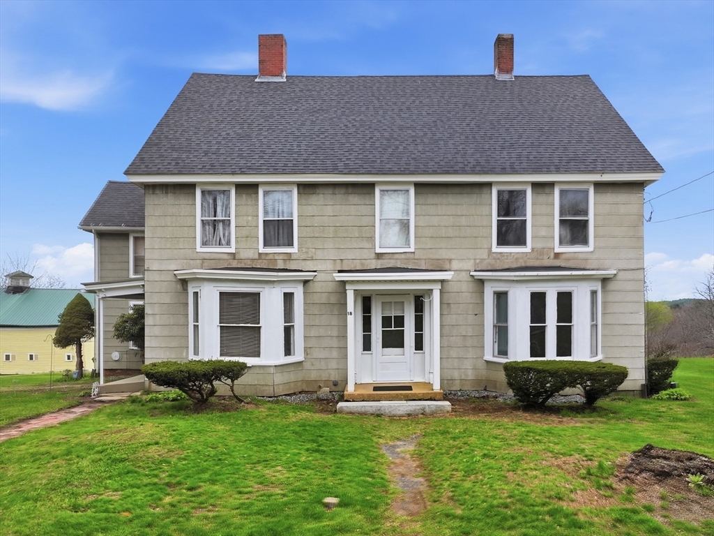 16 Main Street Brookfield, MA 01506 - Photo 2 of 45 a front view of a house with a yard