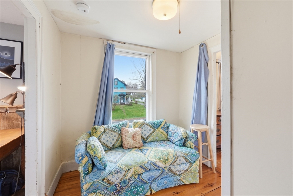 16 Main Street Brookfield, MA 01506 - Photo 21 of 45 a living room with furniture and a window