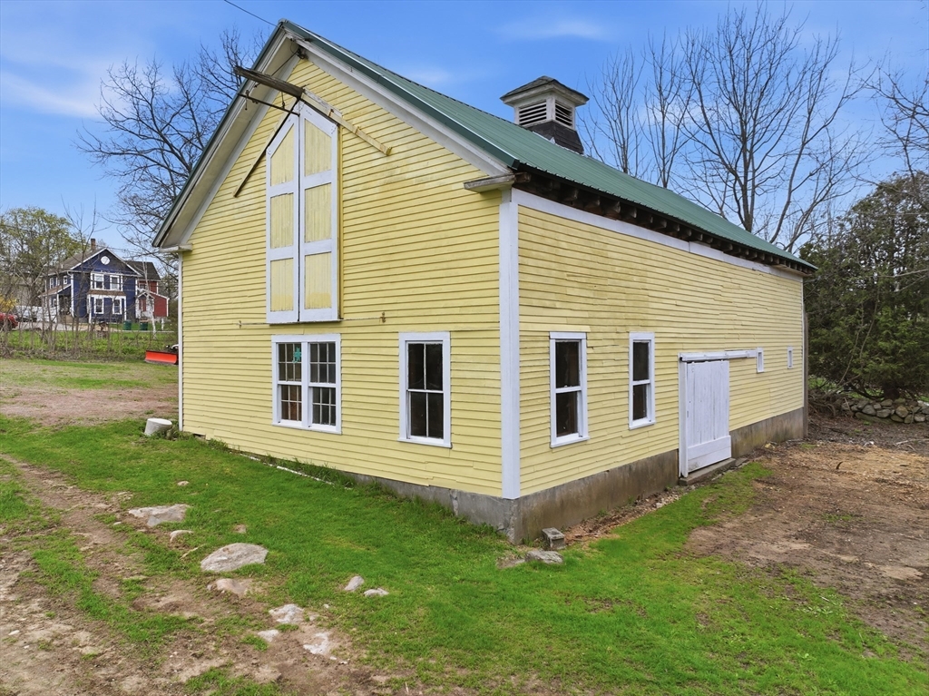 16 Main Street Brookfield, MA 01506 - Photo 36 of 45 a view of a house with a yard