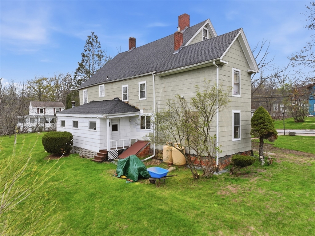 16 Main Street Brookfield, MA 01506 - Photo 41 of 45 a view of a house with a yard