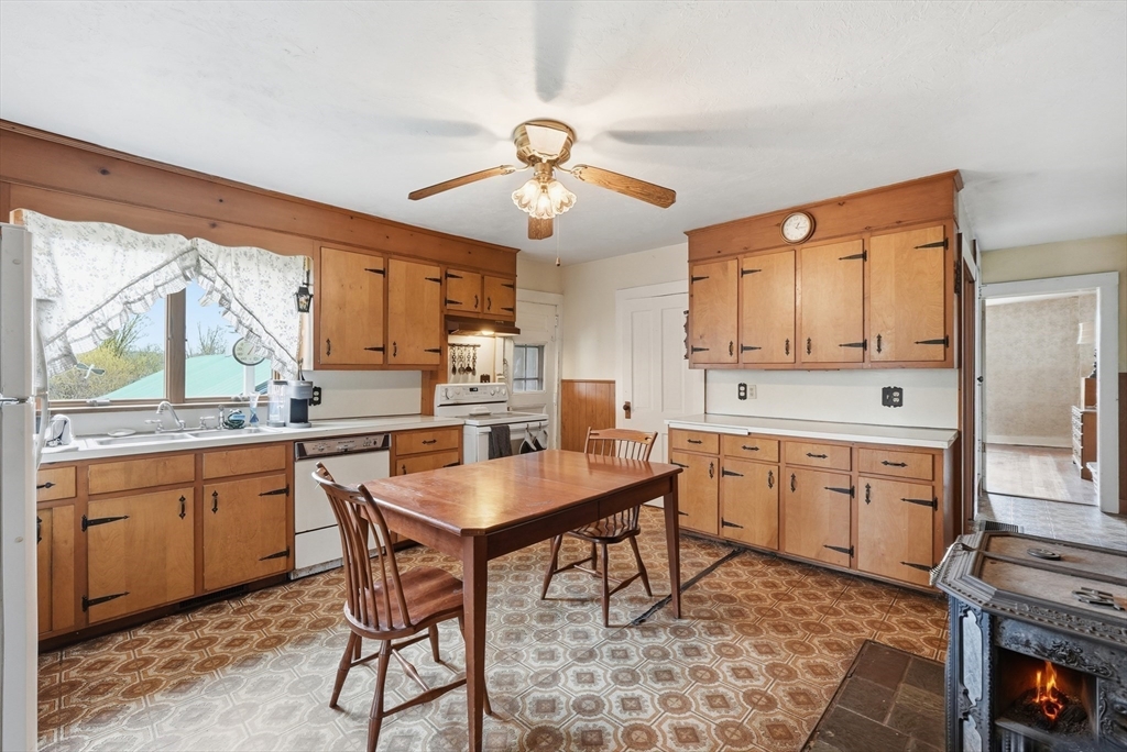 16 Main Street Brookfield, MA 01506 - Photo 6 of 45 a kitchen with granite countertop a sink appliances and cabinets