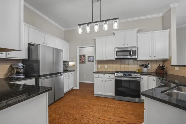 a house with trees in front of it