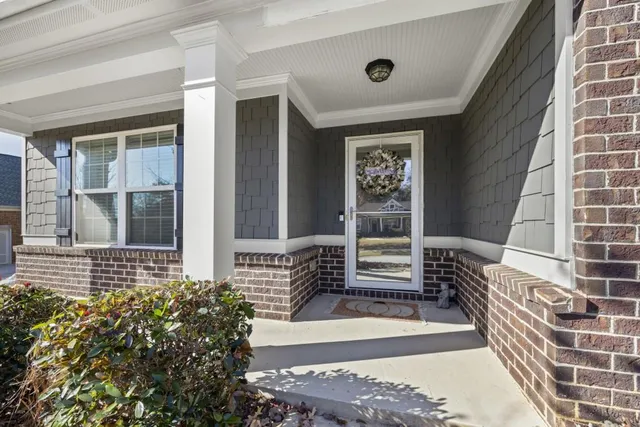 a view of a livingroom with wooden floor