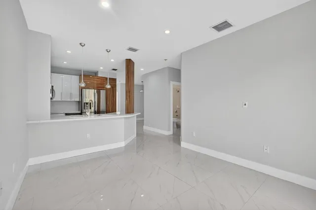 a bathroom with a bathtub and a toilet