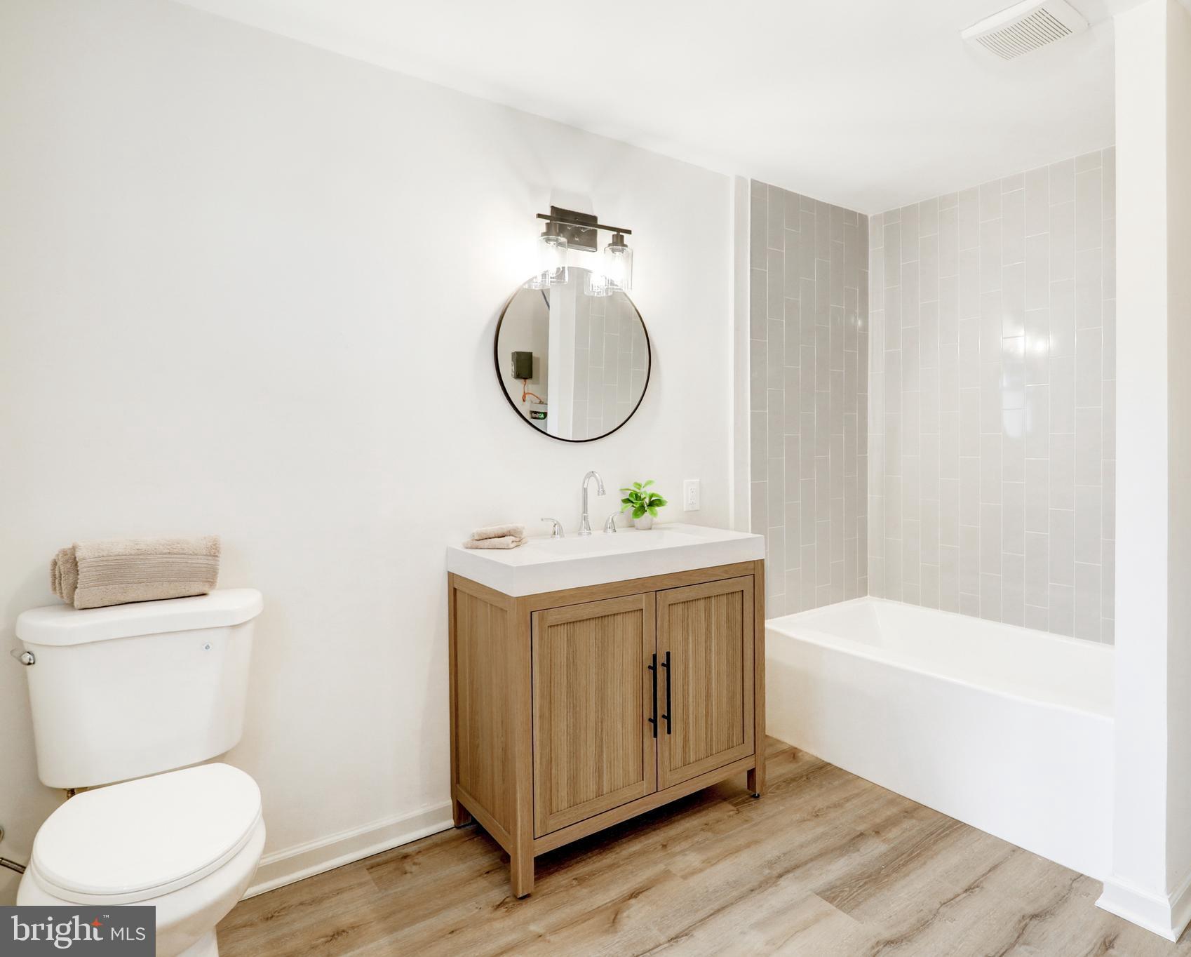 5 Edgewood Avenue Temple, PA 19560 - Photo 12 of 30 a bathroom with a sink a toilet and a mirror