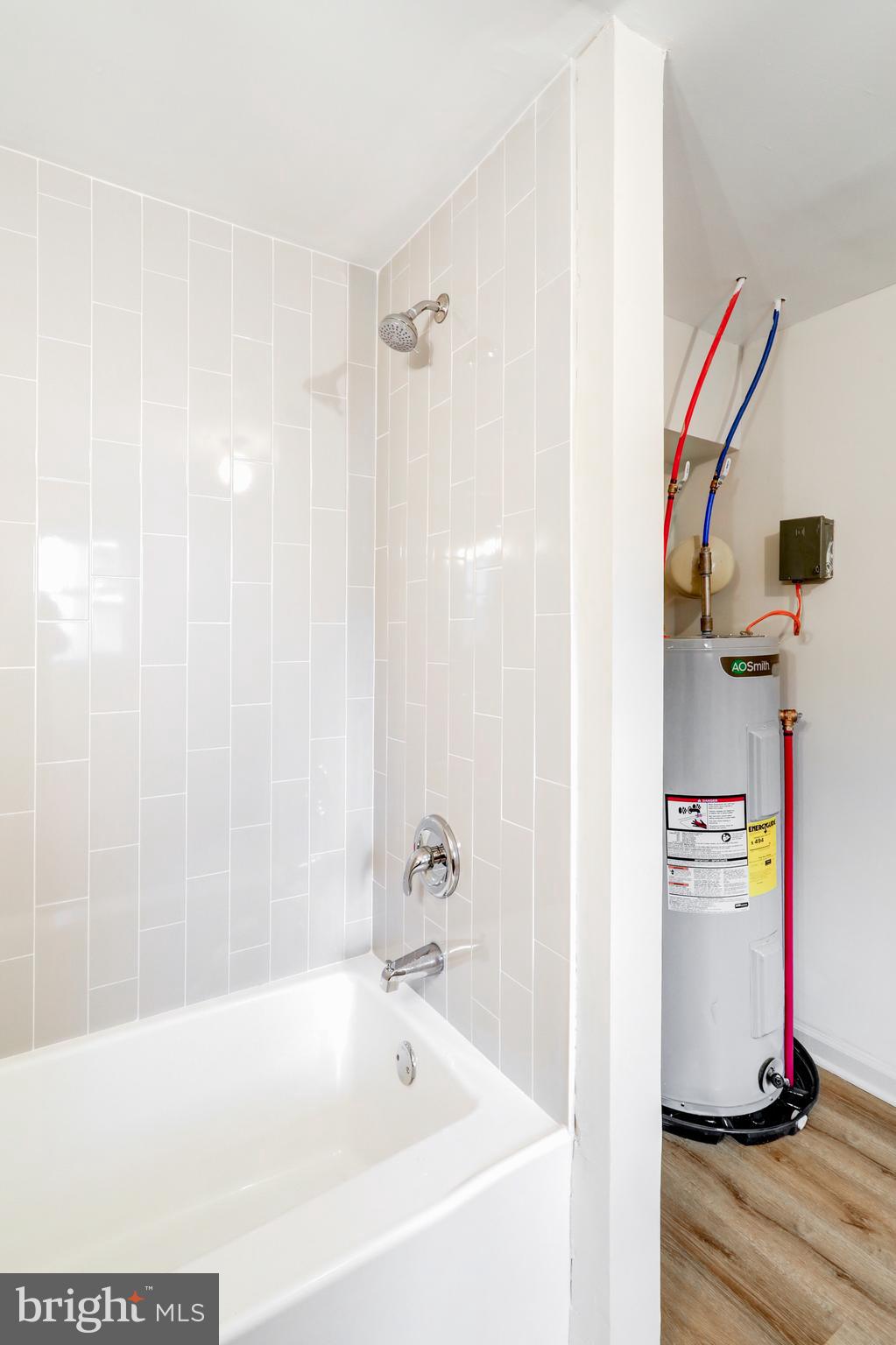 5 Edgewood Avenue Temple, PA 19560 - Photo 14 of 30 a bathroom with a bathtub and a shower