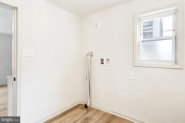 a view of small space with wooden floor