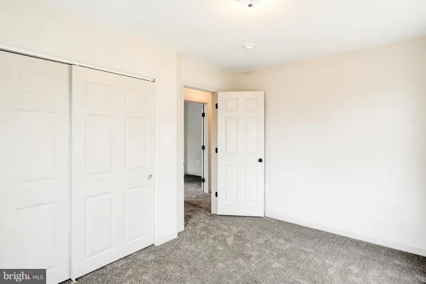 a bathroom with a toilet and a sink