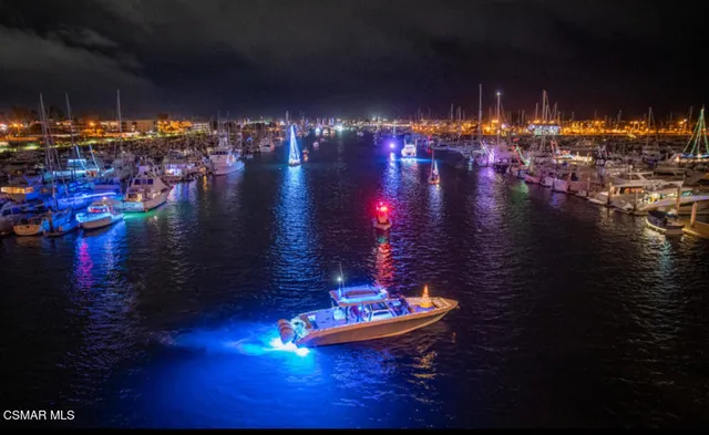 a group of people sitting outside of a city