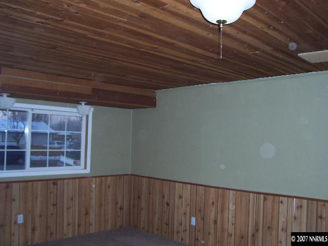 9210 Fremont Way Reno, NV 89506 - Photo 2 of 9 a view of wooden floor and a window