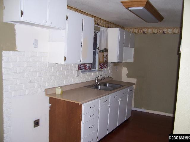 9210 Fremont Way Reno, NV 89506 - Photo 3 of 9 a view of a kitchen with cabinets