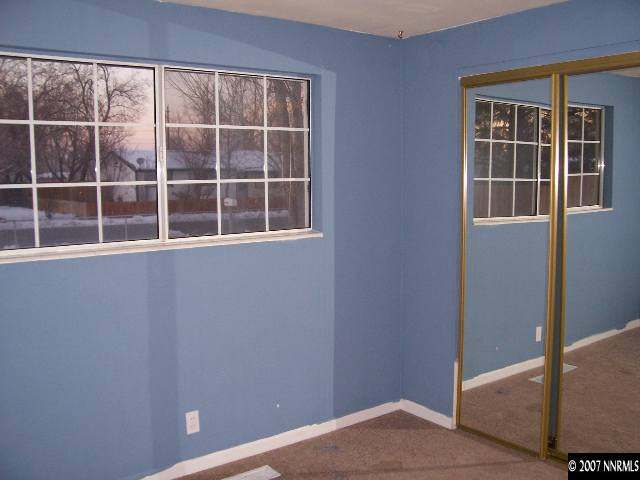 9210 Fremont Way Reno, NV 89506 - Photo 7 of 9 a view of empty room with windows