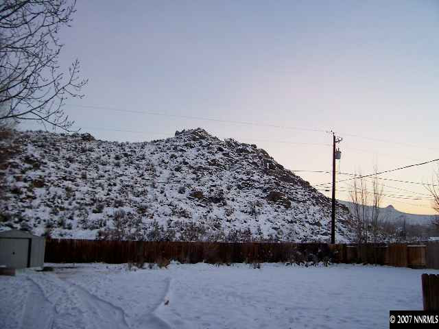 9210 Fremont Way Reno, NV 89506 - Photo 9 of 9 a large building with a yard
