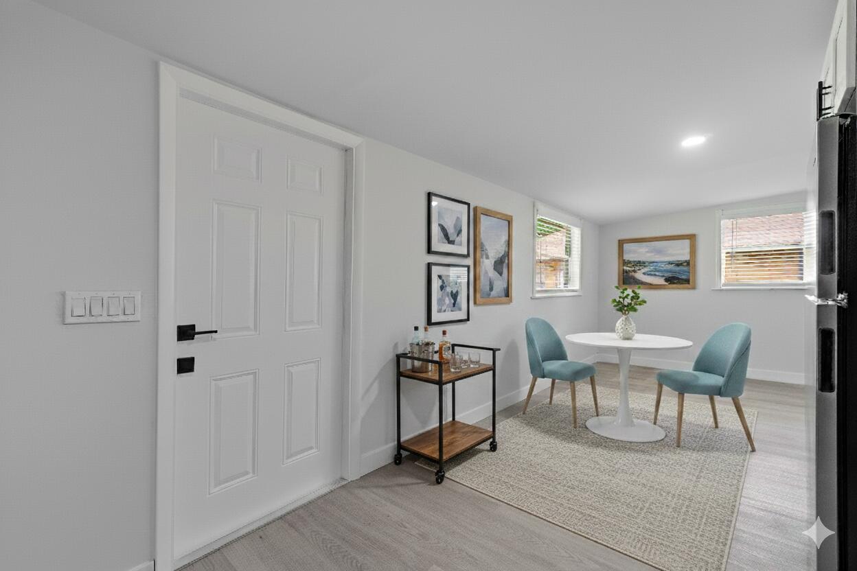 137 Southwest 9th Avenue Delray Beach, FL 33444 - Photo 5 of 26 a view of a livingroom with furniture and wooden floor