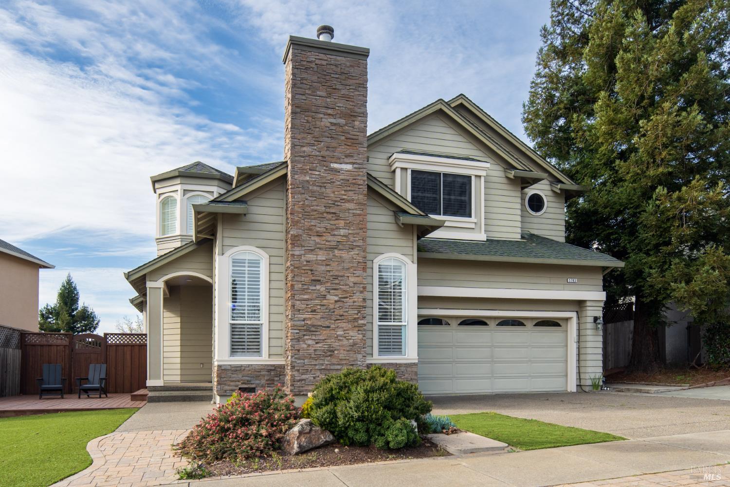 5783 Owl Light Terrace Santa Rosa, CA 95409 - Photo 1 of 51 a front view of a house with a yard and garage