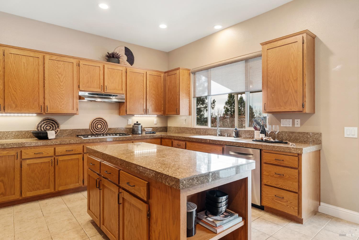 5783 Owl Light Terrace Santa Rosa, CA 95409 - Photo 12 of 51 a kitchen with stainless steel appliances granite countertop a sink stove and cabinets
