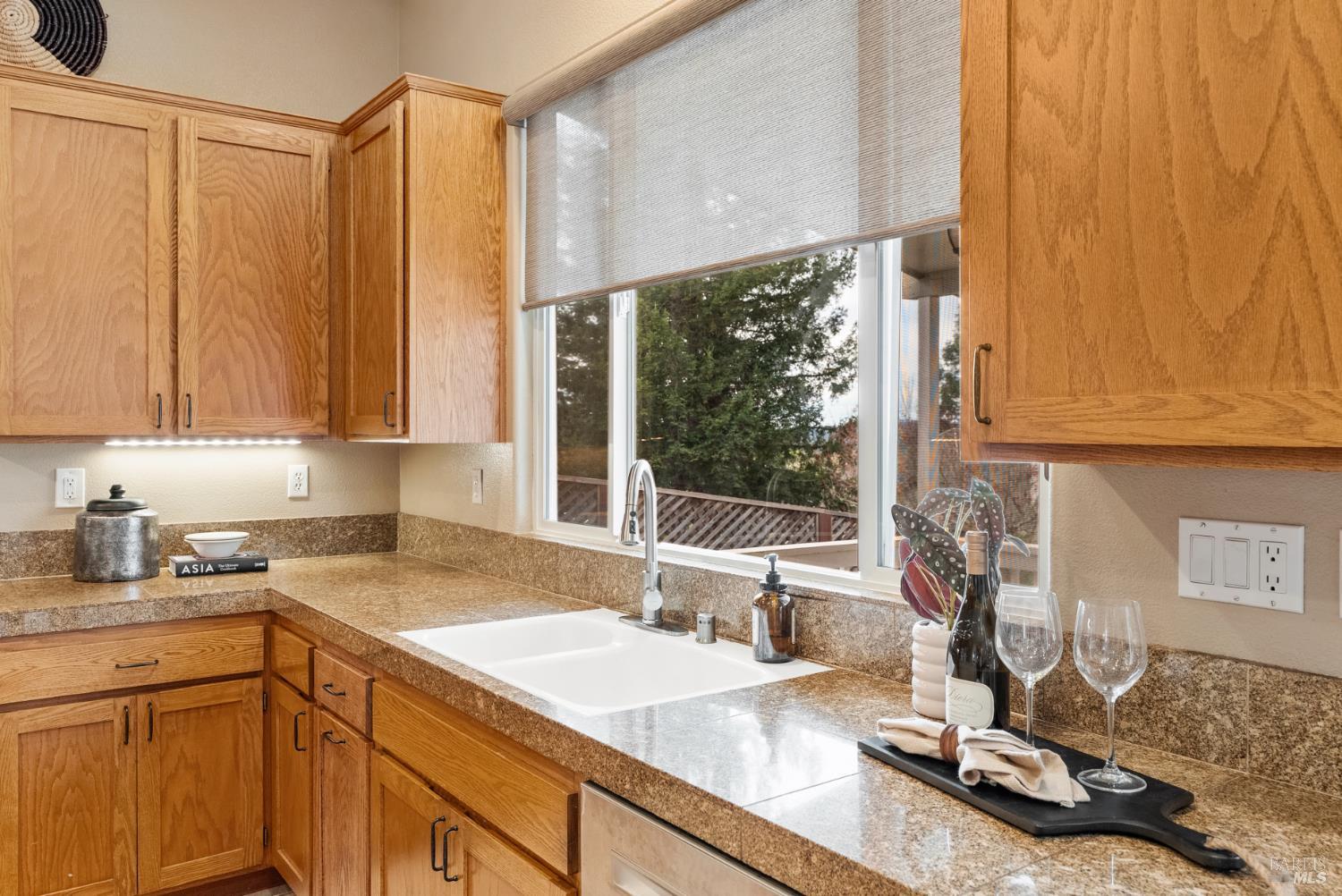 5783 Owl Light Terrace Santa Rosa, CA 95409 - Photo 17 of 51 a kitchen with a sink and cabinets