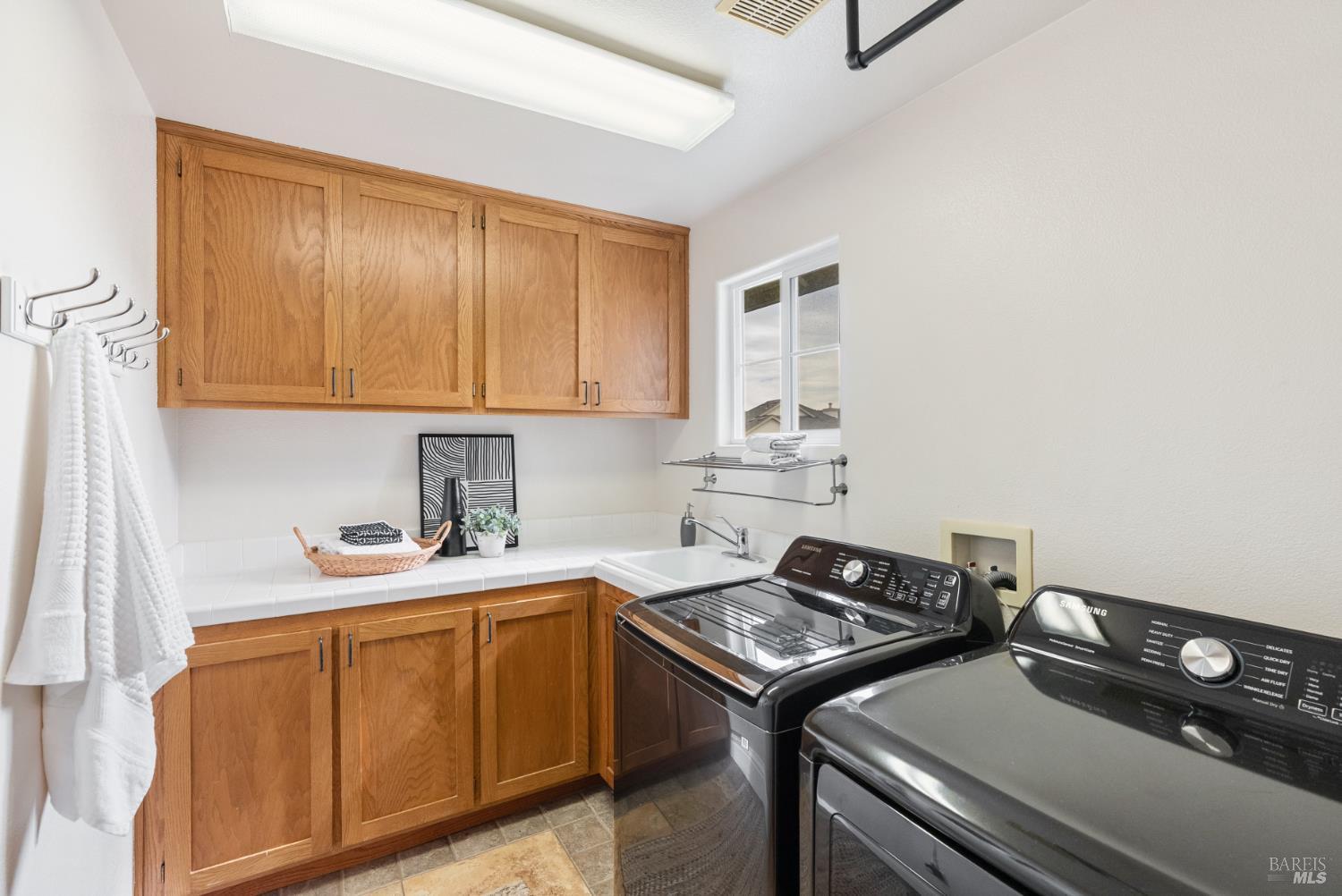 5783 Owl Light Terrace Santa Rosa, CA 95409 - Photo 32 of 51 a kitchen with a stove and a sink
