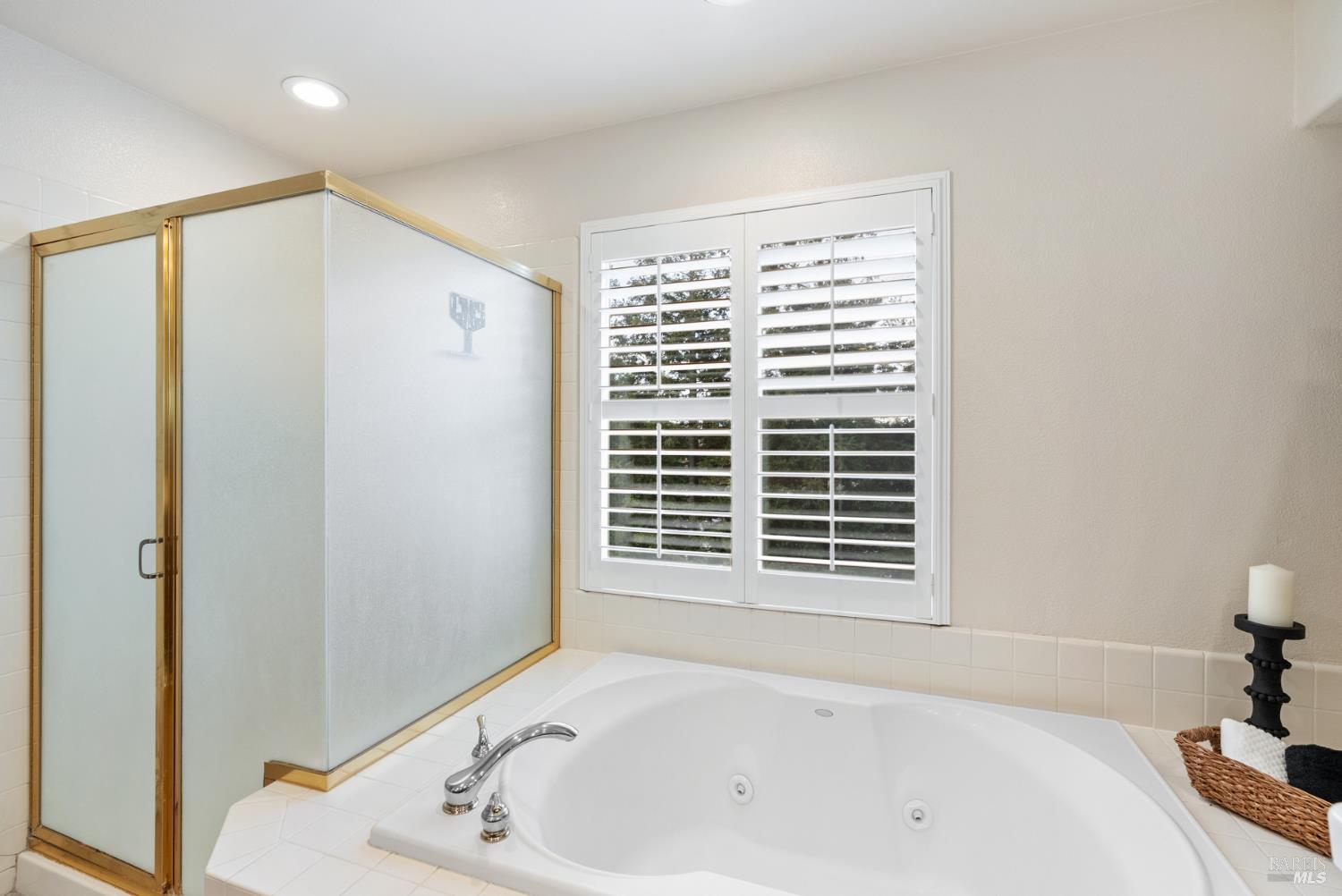 5783 Owl Light Terrace Santa Rosa, CA 95409 - Photo 38 of 51 a bathroom with a bathtub and a window