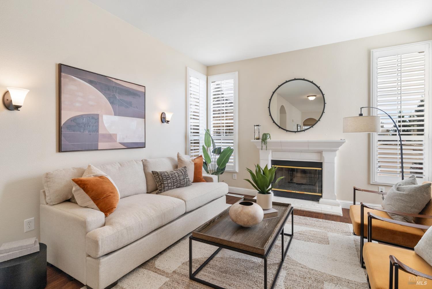 5783 Owl Light Terrace Santa Rosa, CA 95409 - Photo 4 of 51 a living room with furniture a fireplace with wooden floor