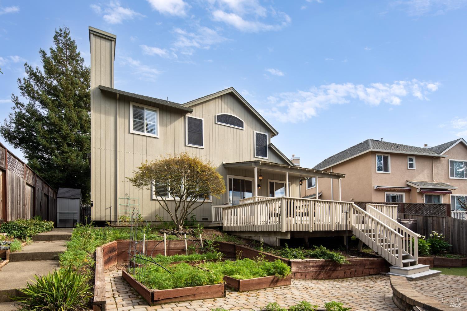 5783 Owl Light Terrace Santa Rosa, CA 95409 - Photo 47 of 51 a front view of a house with a yard and potted plants