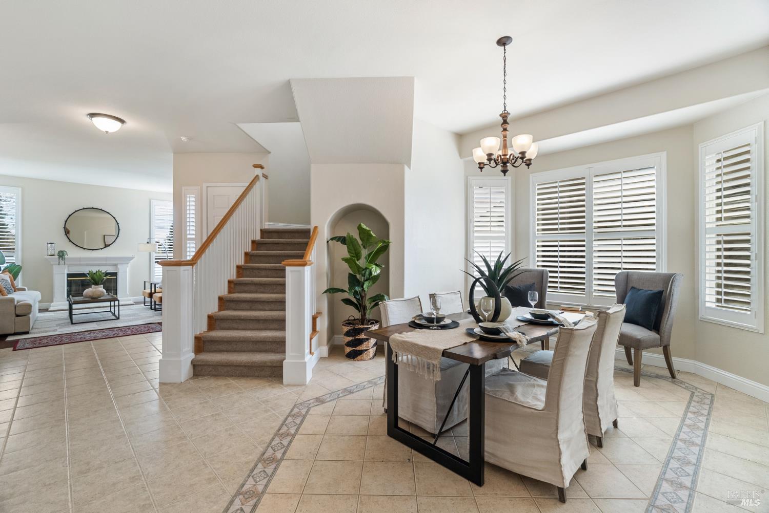 5783 Owl Light Terrace Santa Rosa, CA 95409 - Photo 10 of 51 a view of a livingroom with furniture and a floor to ceiling window