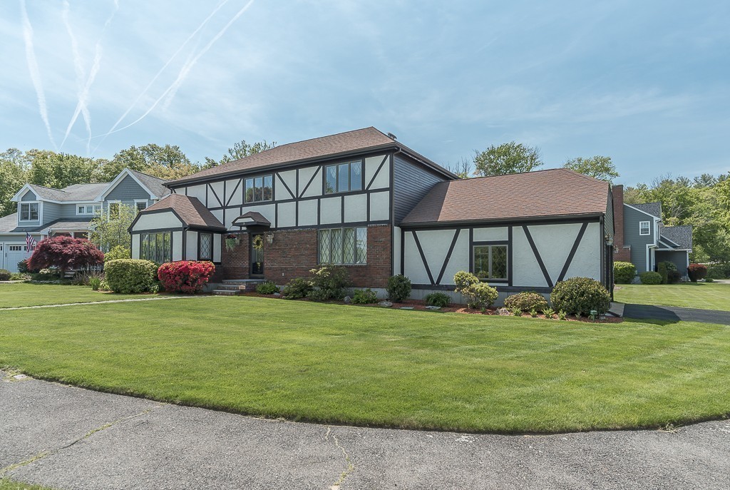 26 Meadow Road Beverly, MA 01915 - Photo 1 of 20 a front view of a house with garden