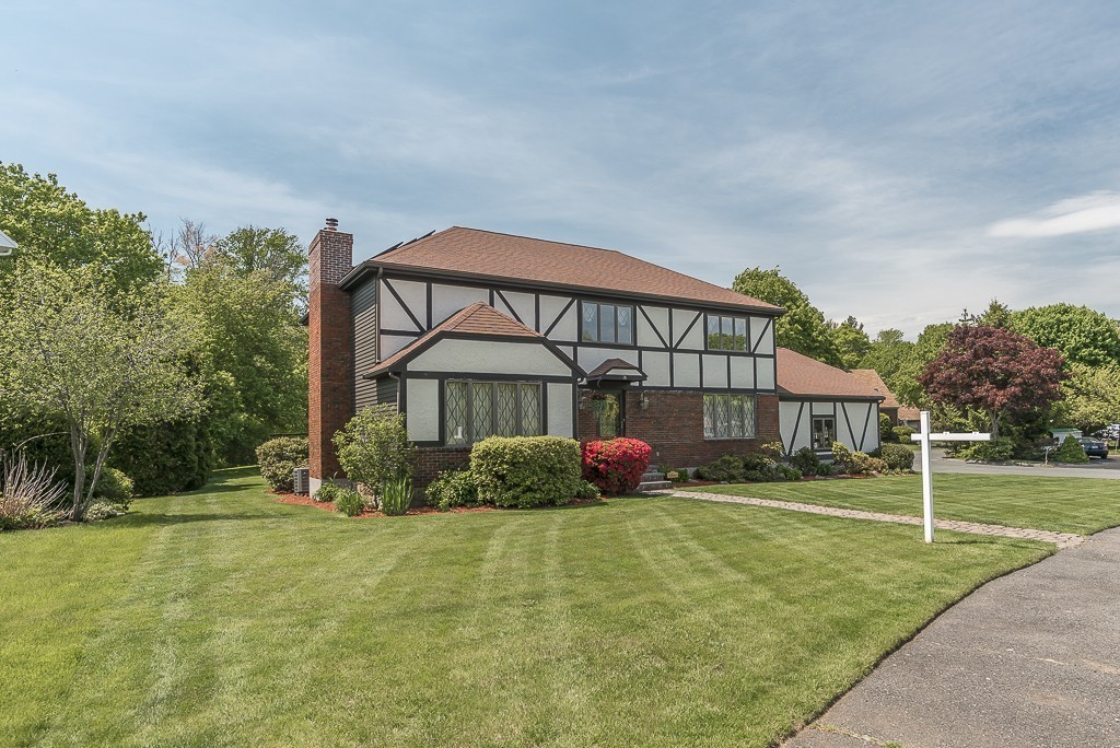 26 Meadow Road Beverly, MA 01915 - Photo 2 of 20 front view of a house with a yard