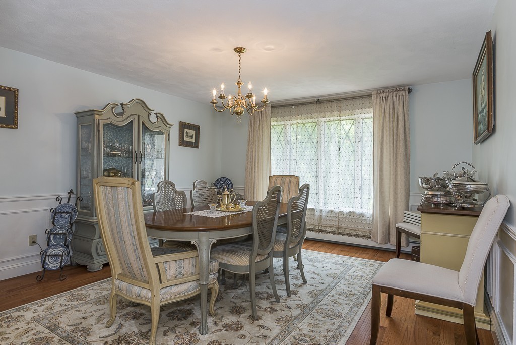 26 Meadow Road Beverly, MA 01915 - Photo 7 of 20 a view of a dining room with furniture window and outside view