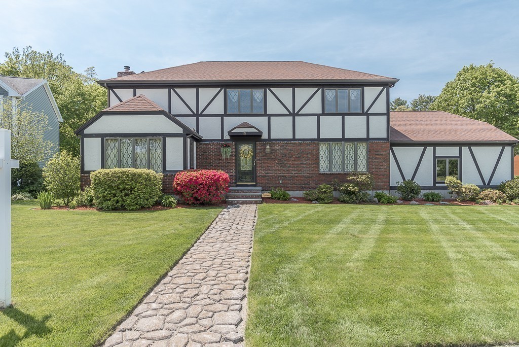 26 Meadow Road Beverly, MA 01915 - Photo 8 of 20 a front view of a house with garden