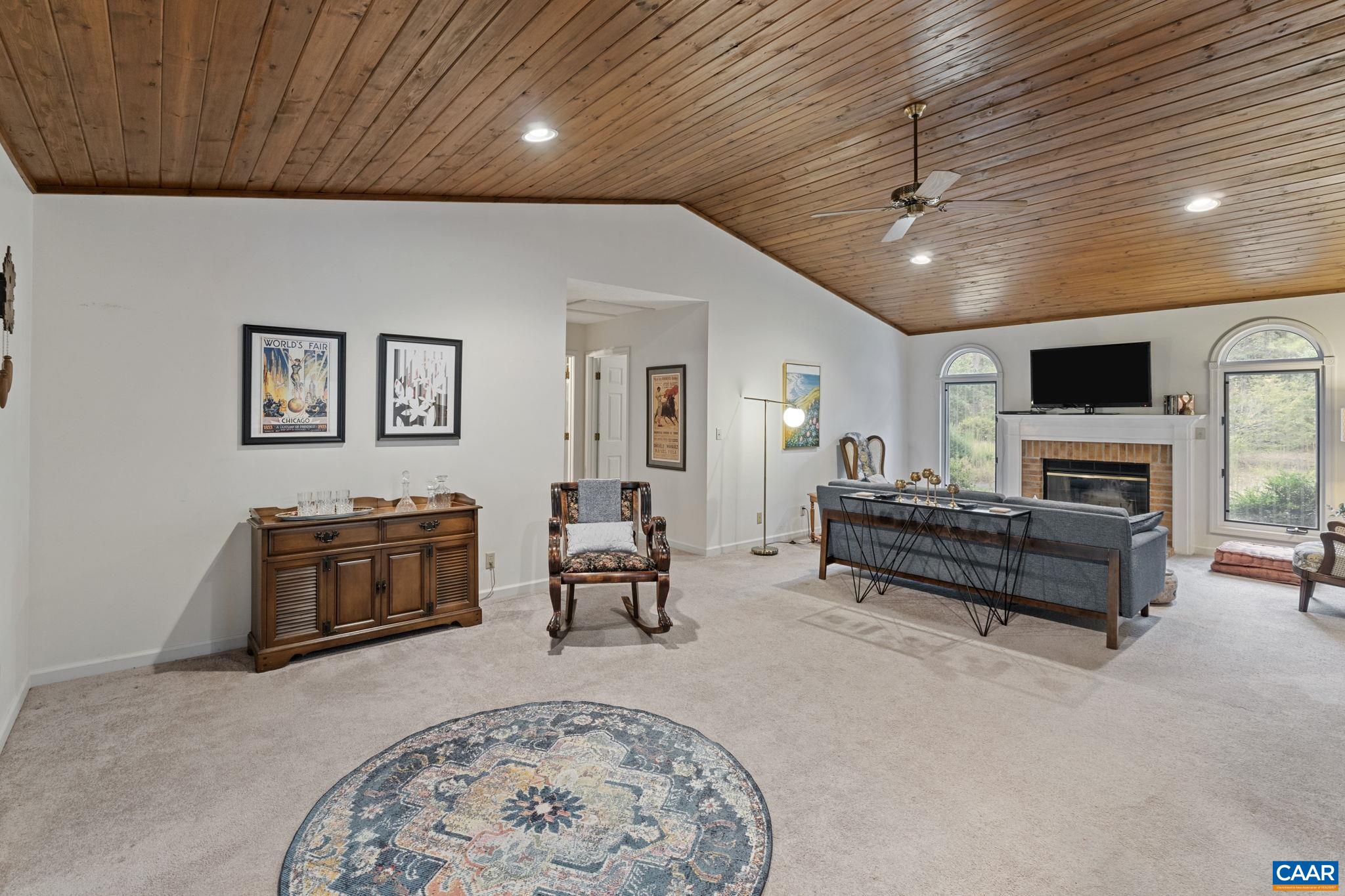 25 Loblolly Road Palmyra, VA 22963 - Photo 8 of 41 a living room with furniture and a flat screen tv