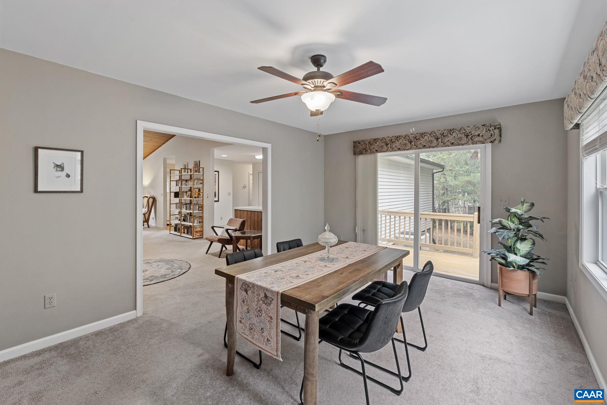 25 Loblolly Road Palmyra, VA 22963 - Photo 10 of 41 a view of a dining room with furniture and a chandelier